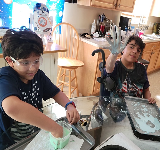 Shawn and Keith making slime.